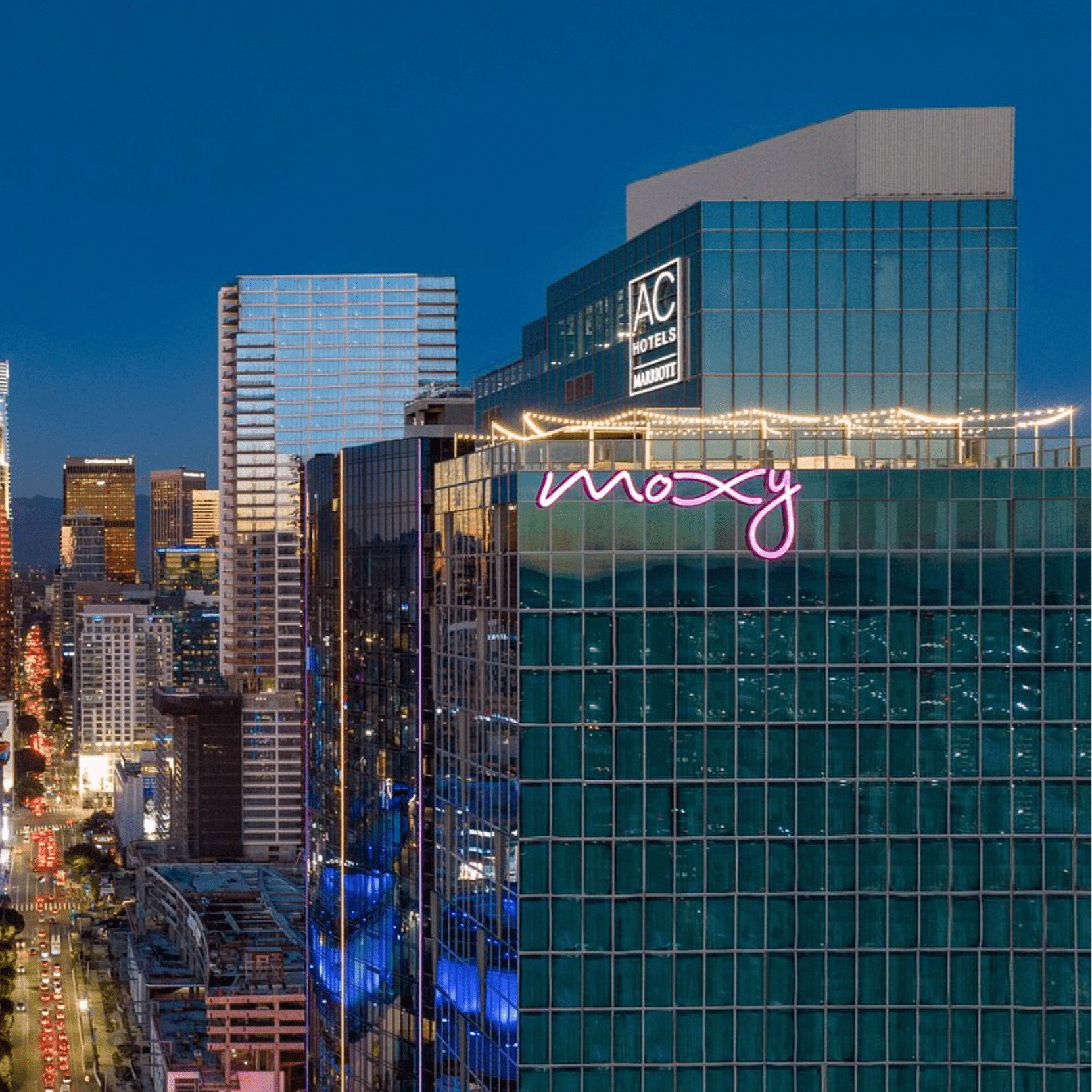 Cooke Mammoth Dining Fire Tables overlooking DTLA Skyline at a new Moxy Hotel
