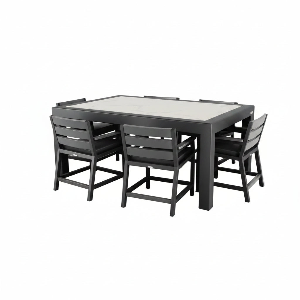 Black dining table with four matching chairs on a white background