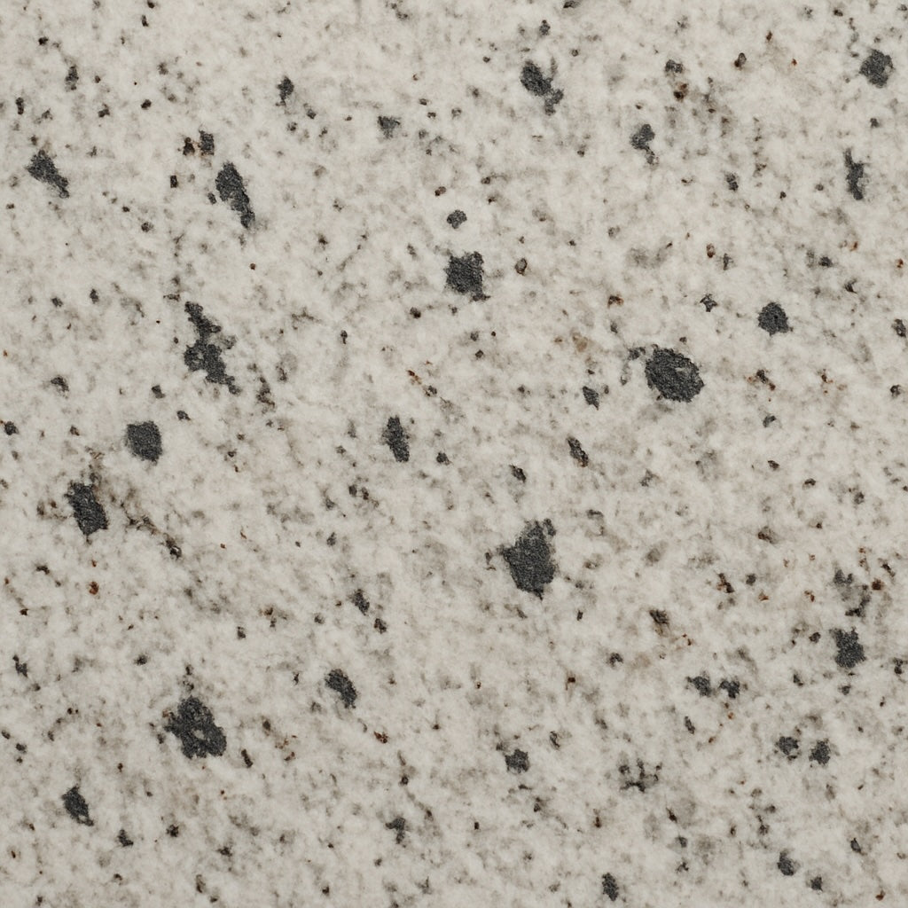 Colonial White granite swatch with ivory background and charcoal speckling—perfect for durable outdoor countertops and fire pit tables.
