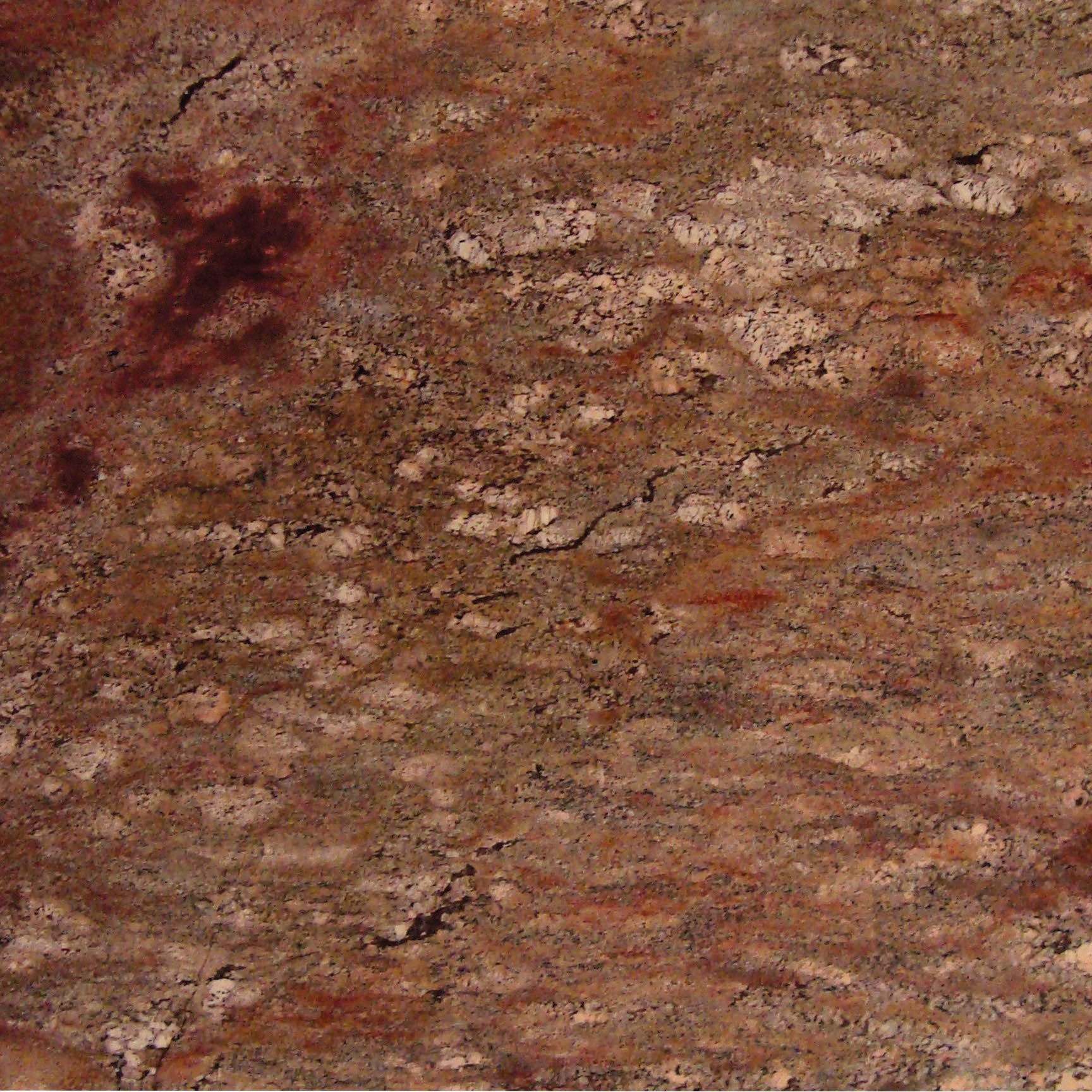 Crema Bordeaux granite swatch with rich burgundy, gold, and cream veining—ideal for elegant, durable outdoor countertops and custom stone designs.