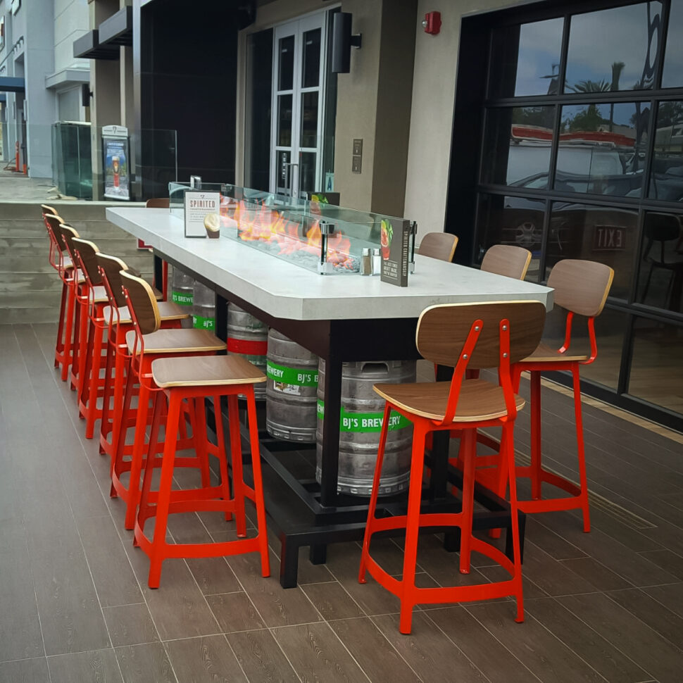 COOKE Long Beach. Custom bar height fire pit tables for restaurants, breweries, or distilleries.